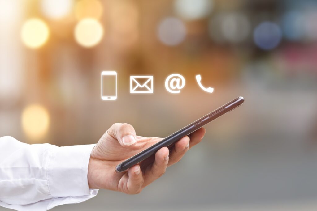 close up image of man hands using mobile smartphone with mail phone email icon contact us connection t20 e9m0lo close up image of man hands using mobile smartphone with mail phone email icon contact us connection t20 e9m0lo